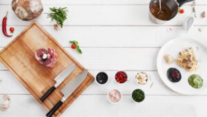 Fresh ingredients and prepared food illustrating German-to-English food and drink translation for international markets