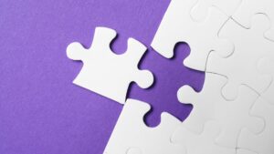 Puzzle pieces illustrating how literal translation may not fit naturally in English without adaptation